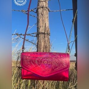 Metallic Punch Clutch - Pink metallic exterior and a tooled envelope top design
